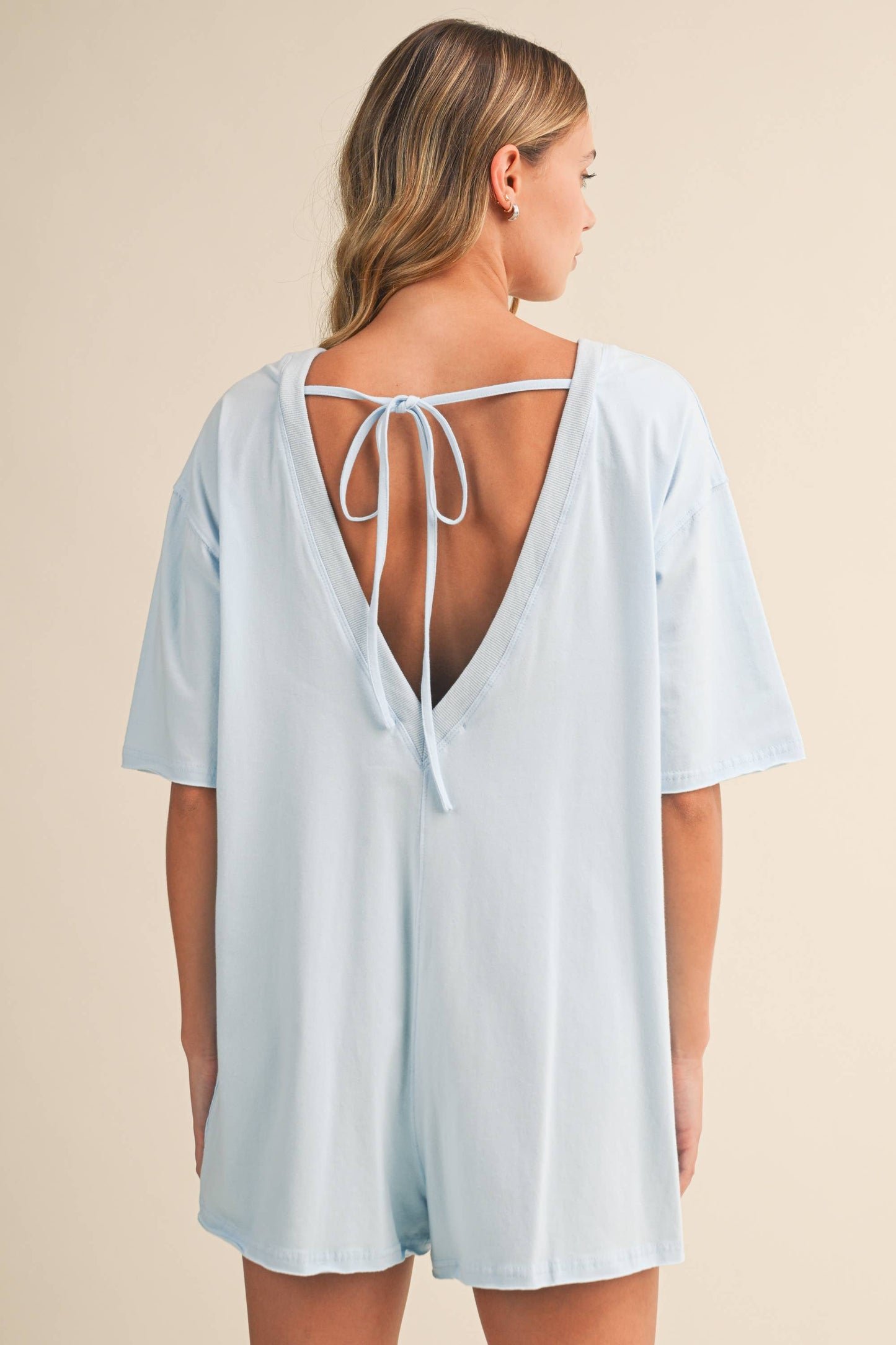 SHORT SLEEVE RELAXED FIT FRONT POCKETED ROMPER