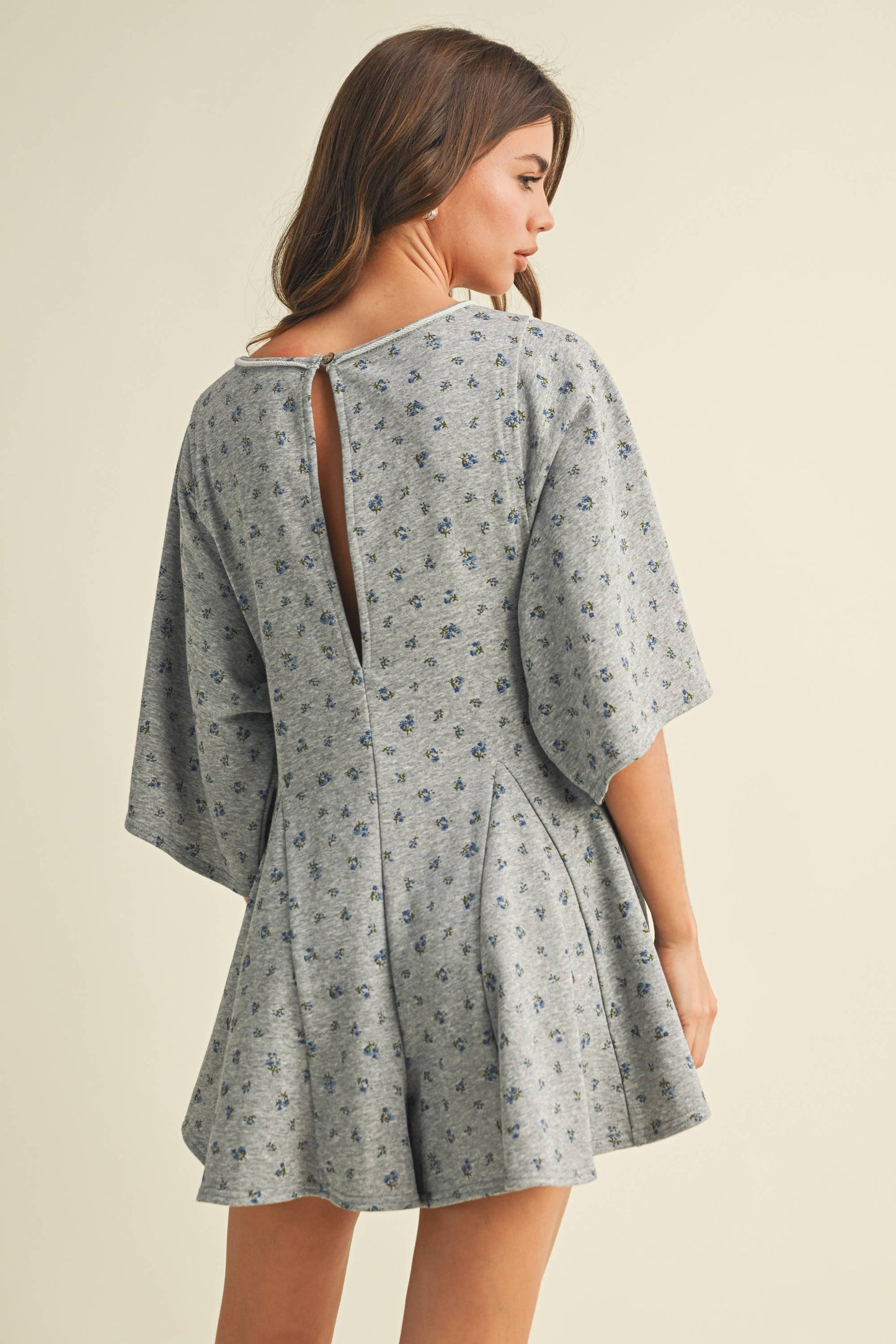 FLORAL FRONT POCKET GODET FLOWY ROMPER