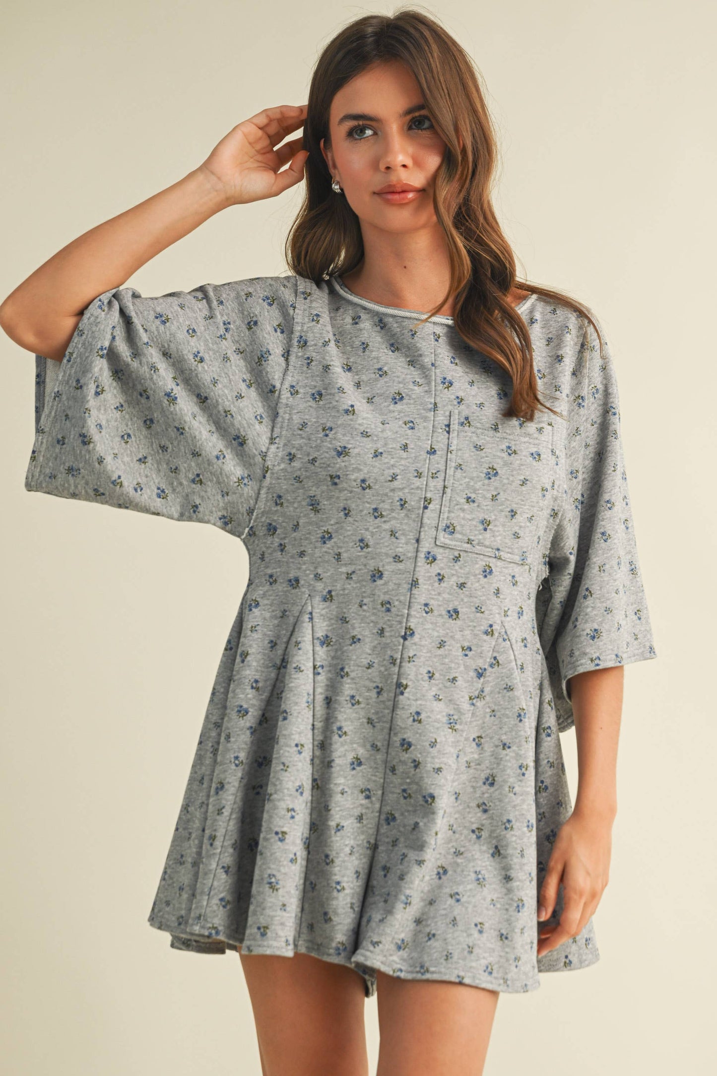FLORAL FRONT POCKET GODET FLOWY ROMPER