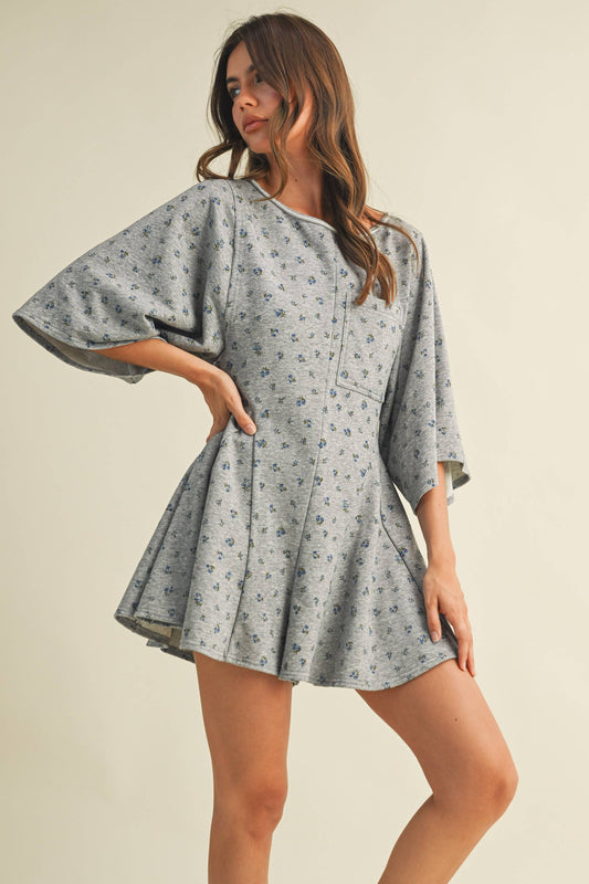 FLORAL FRONT POCKET GODET FLOWY ROMPER