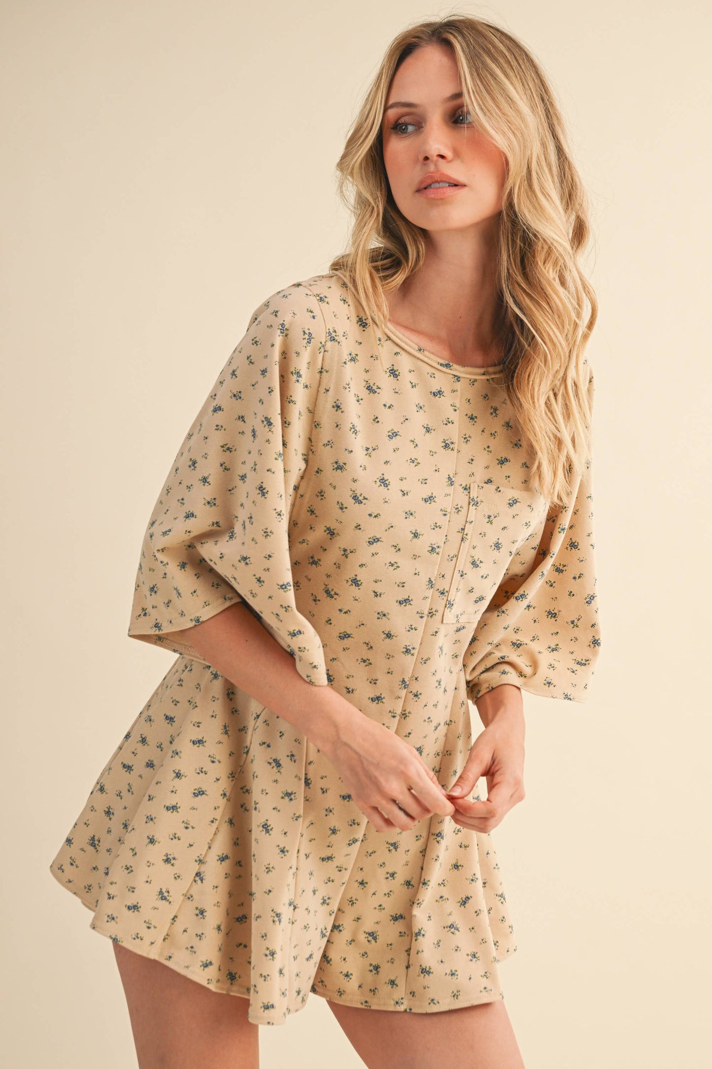 FLORAL FRONT POCKET GODET FLOWY ROMPER