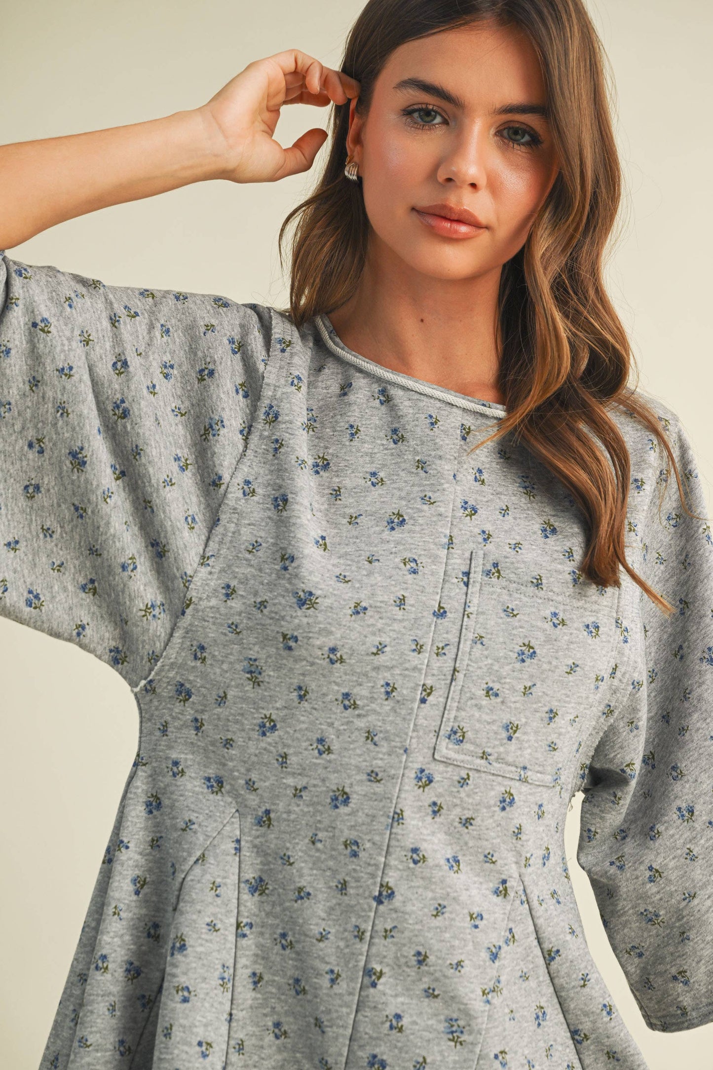 FLORAL FRONT POCKET GODET FLOWY ROMPER