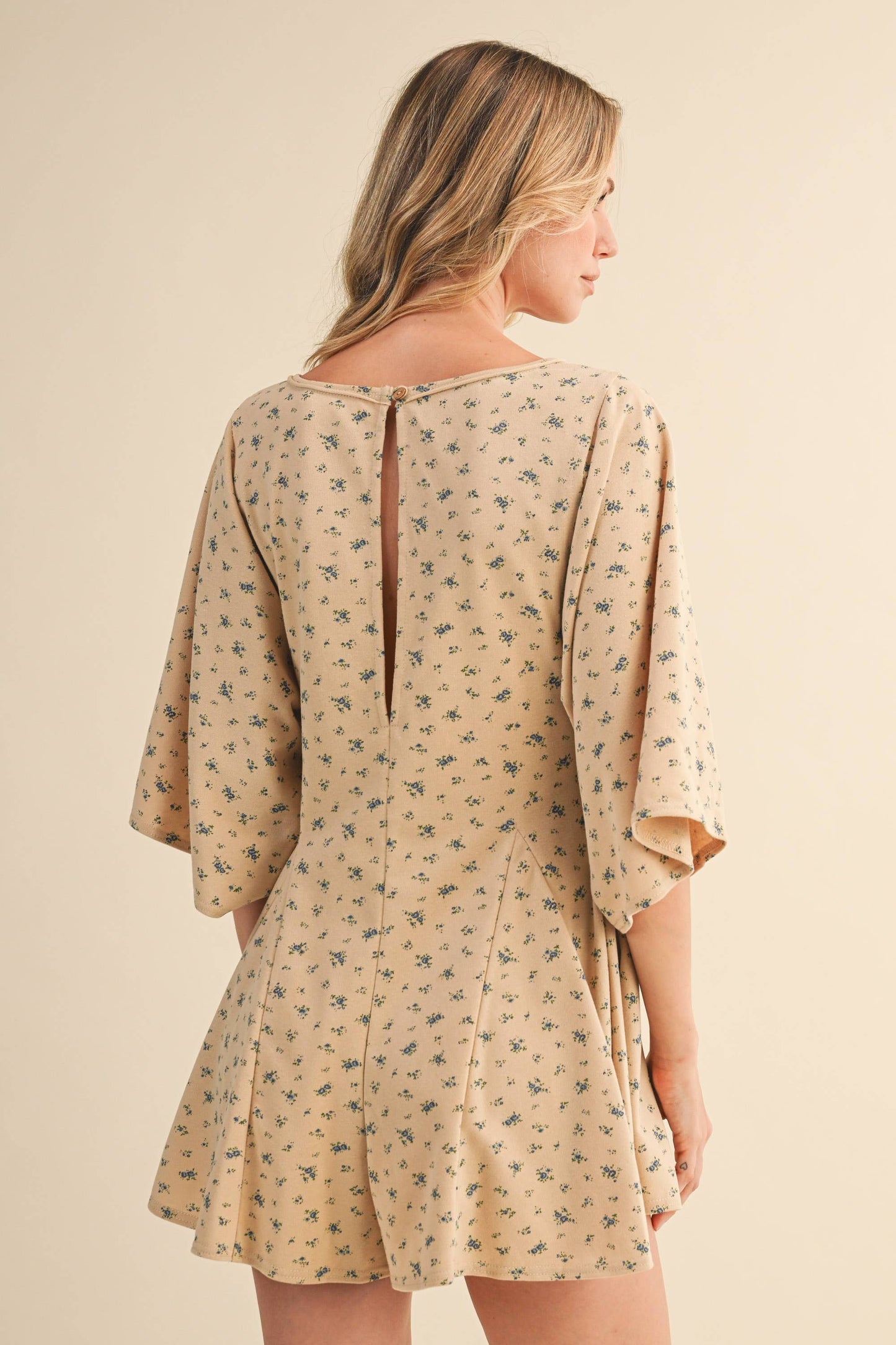 FLORAL FRONT POCKET GODET FLOWY ROMPER