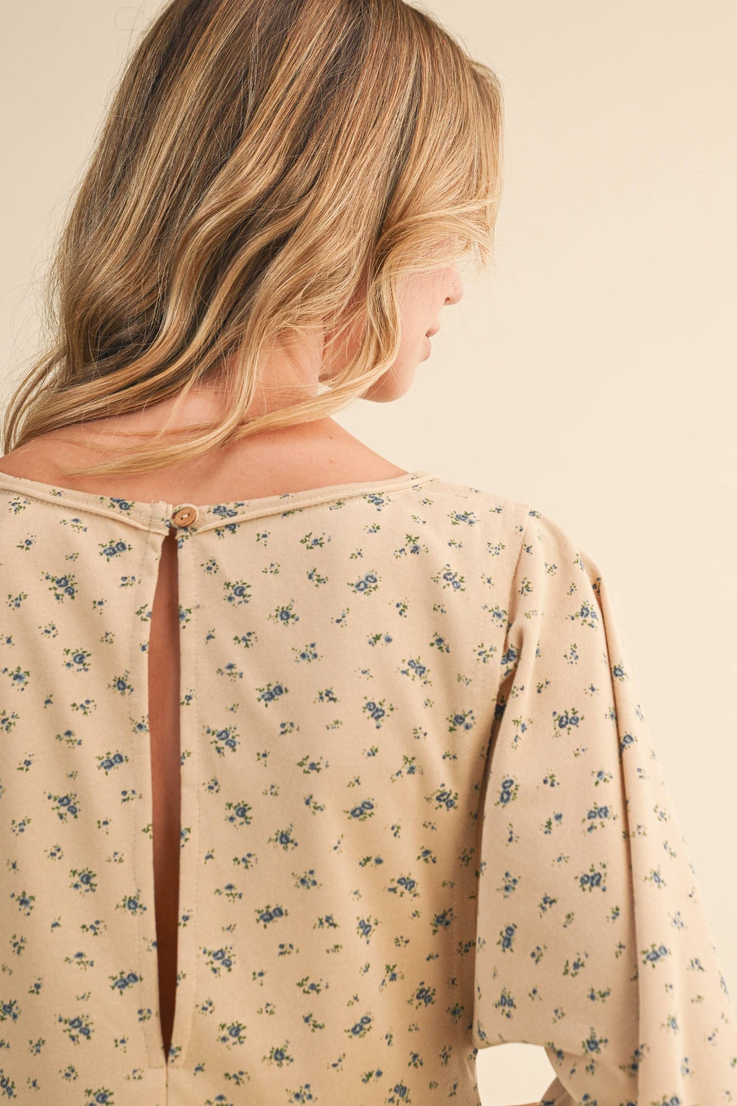 FLORAL FRONT POCKET GODET FLOWY ROMPER