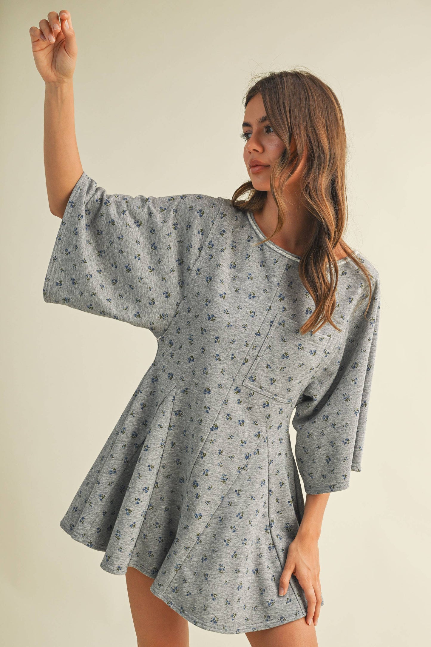 FLORAL FRONT POCKET GODET FLOWY ROMPER