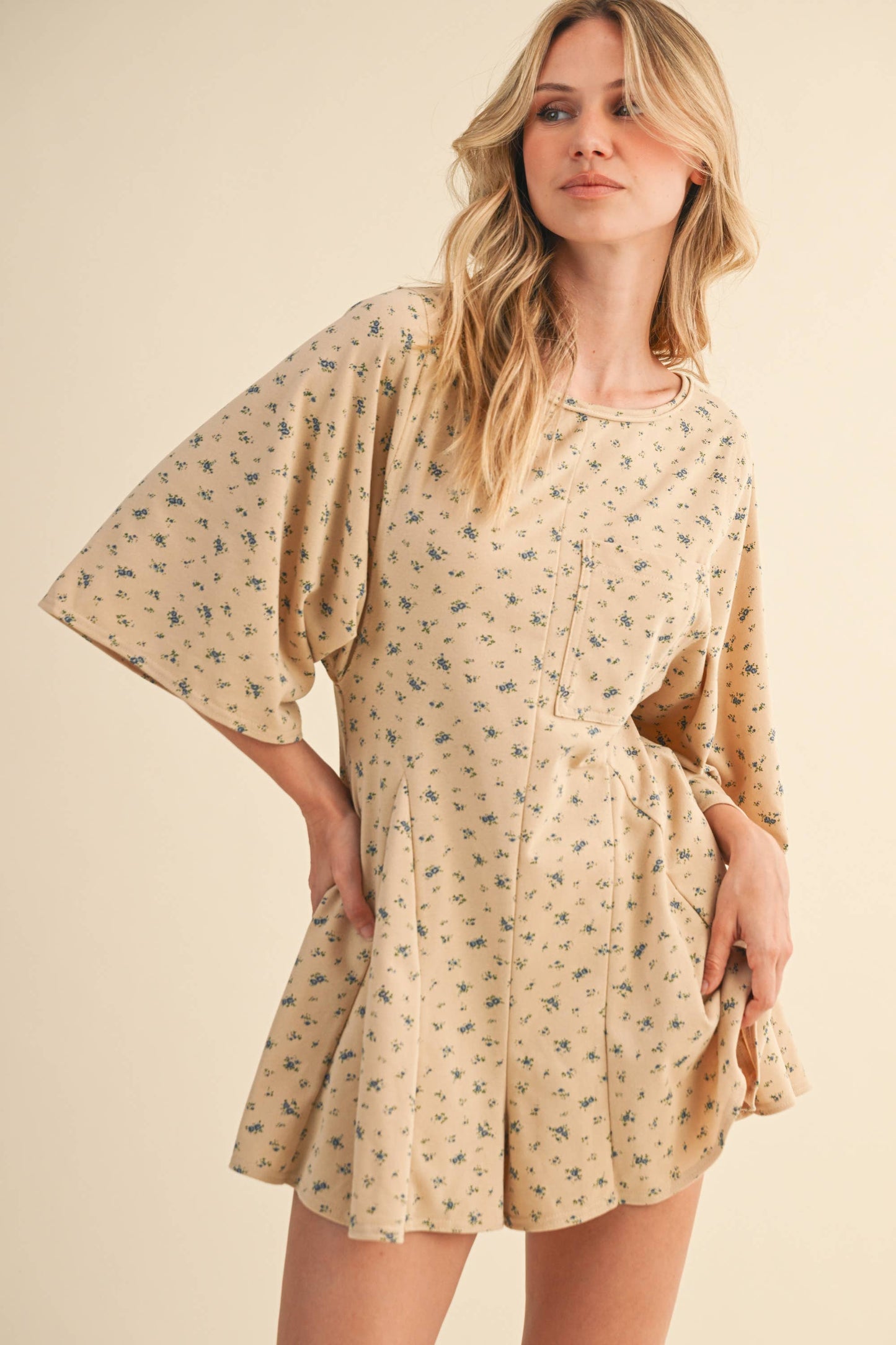 FLORAL FRONT POCKET GODET FLOWY ROMPER