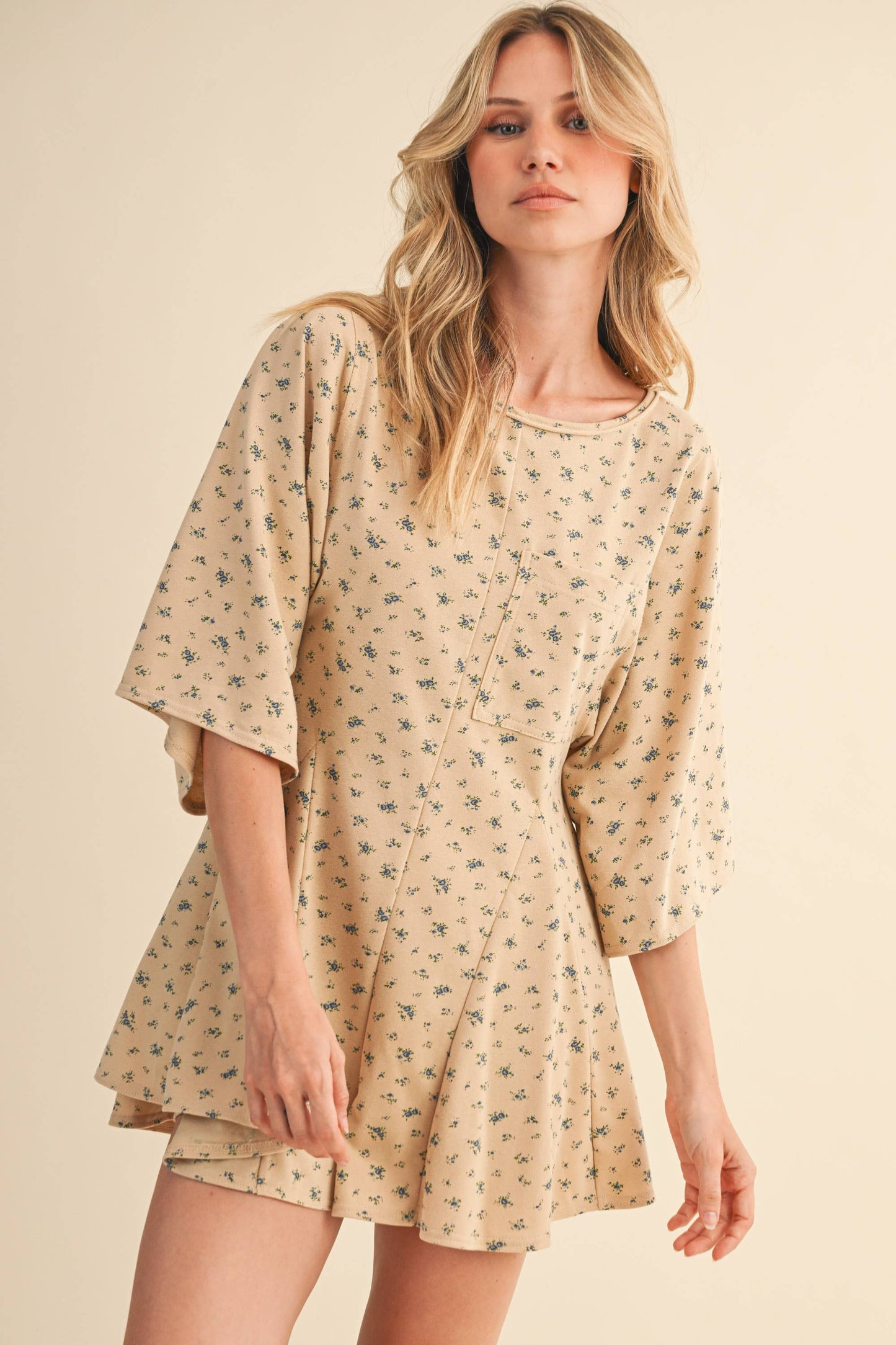 FLORAL FRONT POCKET GODET FLOWY ROMPER