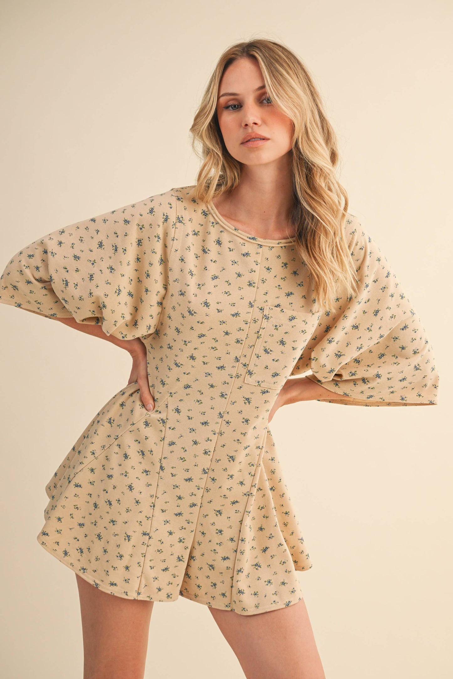FLORAL FRONT POCKET GODET FLOWY ROMPER